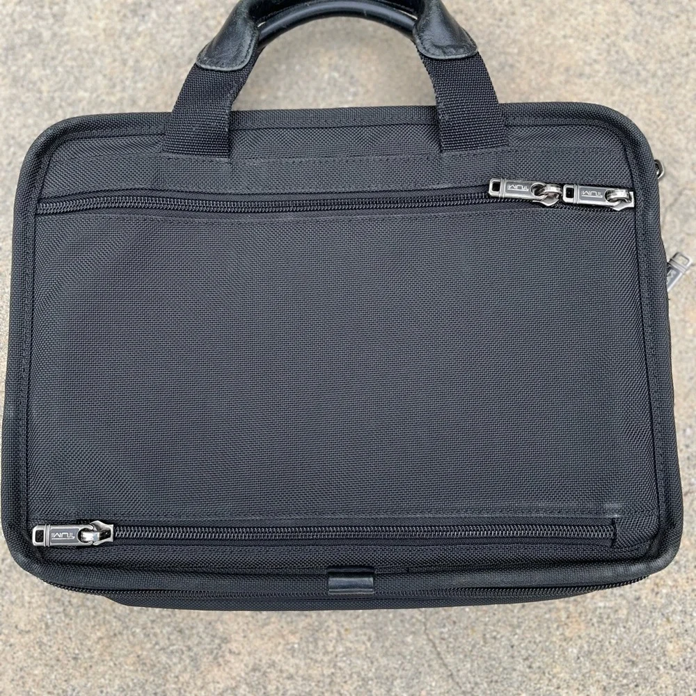 Tumi Black Professional Briefcase with Durable Nylon Design